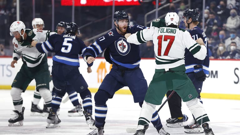 Watch: Wild, Jets erupt with dueling hockey fights