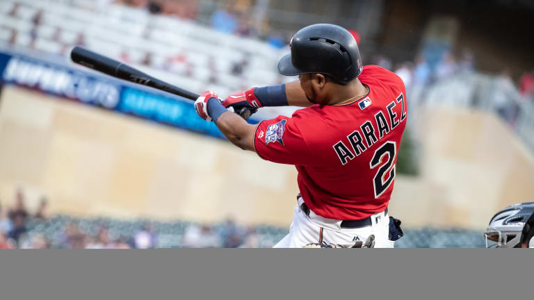 Arráez's triple gives Twins rare extra-inning victory