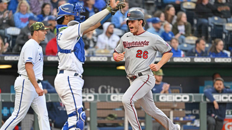 2-out hits help Twins clinch series against Royals
