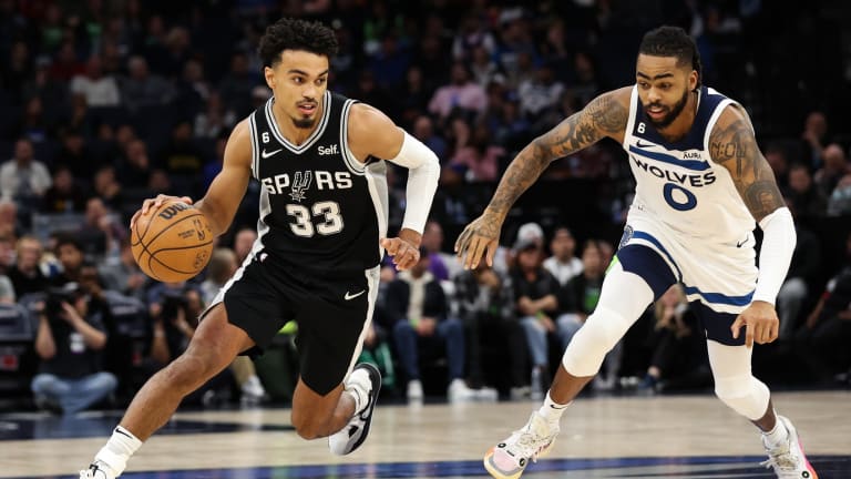 Spurs squash lethargic Wolves to sound of boos in Minnesota