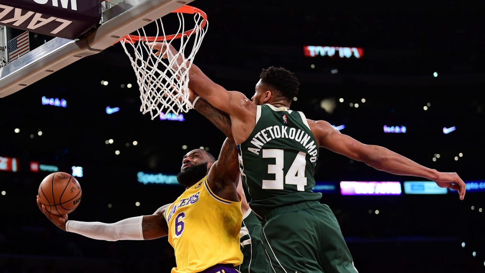 Los Angeles Lakers forward LeBron James (6) moves to the basket against Milwaukee Bucks forward Giannis Antetokounmpo (34)