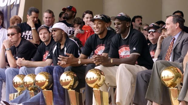 June 16, 1998; Chicago Bulls with their six championship trophies;  Luc Longley, Toni Kukoc, Ron Harper, Dennis Rodman, Scottie Pippen, Michael Jordan and Chicago Mayor Richard Daley at Grant Park in Chicago