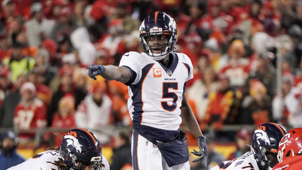 Denver Broncos quarterback Teddy Bridgewater (5) gestures on the line of scrimmage against the Kansas City Chiefs during the first half at GEHA Field at Arrowhead Stadium.