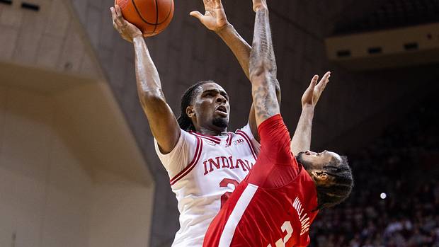 Indiana Hoosiers forward Mackenzie Mgbako (21) shoots the ball while Nebraska Cornhuskers guard Brice Williams (3) defends in the first half at Simon Skjodt Assembly Hall.