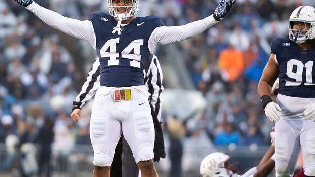 Penn State defensive end Chop Robinson (44) celebrates after sacking Massachusetts quarterback Taisun Phommachanh in the first half of a NCAA football game Saturday, Oct. 14, 2023, in State College, Pa. The Nittany Lions won, 63-0.