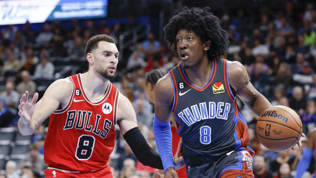 Bulls guard Zach LaVine defends Thunder guard Jalen Williams