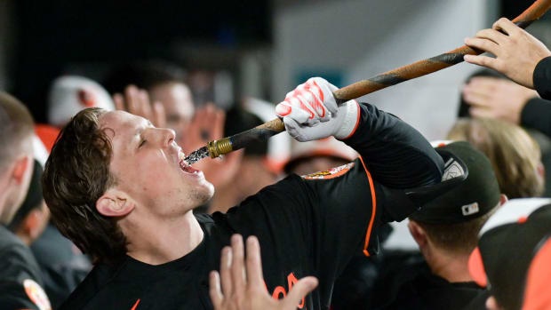 Sep 27, 2023; Baltimore, Maryland, USA; Baltimore Orioles designated hitter Adley Rutschman (35) drinks from the homer hose after hitting a third inning homer run against the Washington Nationals at Oriole Park at Camden Yards.
