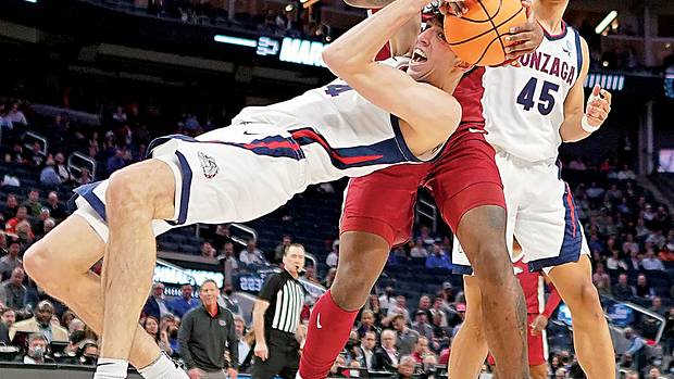 Gonzaga Bulldogs center Chet Holmgren (34) battles for the ball against Arkansas Razorbacks forward Kamani Johnson (20) during the first half in the semifinals of the West regional. The win sets up a rematch of the 1994 national championship game between Duke and Arkansas in the Elite 8 in what is Blue Devils' coach Mike Krzyzewski's final season.