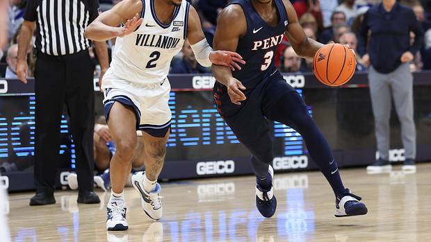 Pennsylvania Quakers guard Jordan Dingle (3) dribbles against Villanova Wildcats guard Mark Armstrong (2) during the first half at William B. Finneran Pavilion.