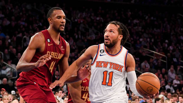 Dec 4, 2022; New York, New York, USA; New York Knicks guard Jalen Brunson (11) drives to the basket on Cleveland Cavaliers forward Evan Mobley (4) during the fourth quarter at Madison Square Garden. Mandatory Credit: Dennis Schneidler-USA TODAY Sports