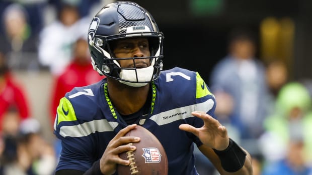 Seattle Seahawks quarterback Geno Smith (7) looks to pass against the New York Jets during the second quarter at Lumen Field.