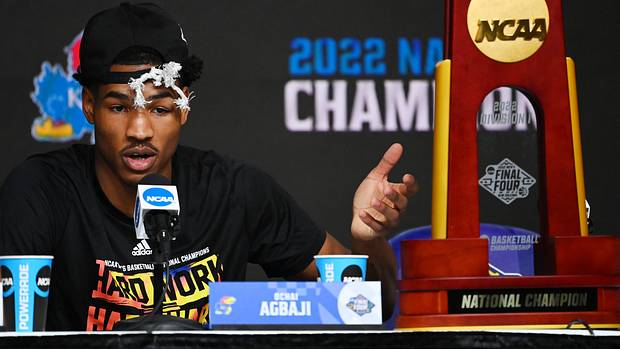 Kansas Jayhawks guard Ochai Agbaji (30) speaks during a press conference after defeating the North Carolina Tar Heels in the 2022 NCAA men's basketball tournament Final Four championship game at Caesars Superdome.