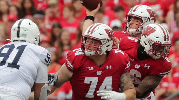 Wisconsin offensive lineman Michael Furtney (No. 74) blocking against Penn State (Credit: Mark Hoffman-USA TODAY Sports)