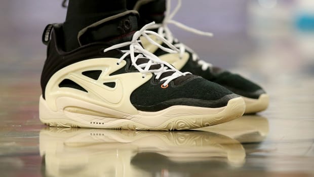 View of Kevin Durant's black and cream Nike shoes.