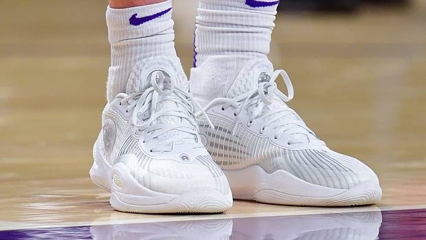 Los Angeles Lakers guard Austin Reaves' white Rigorer sneakers.