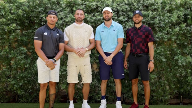 Patrick Mahomes, Travis Kelce, Klay Thompson, and Stephen Curry before the Capital One golf match.