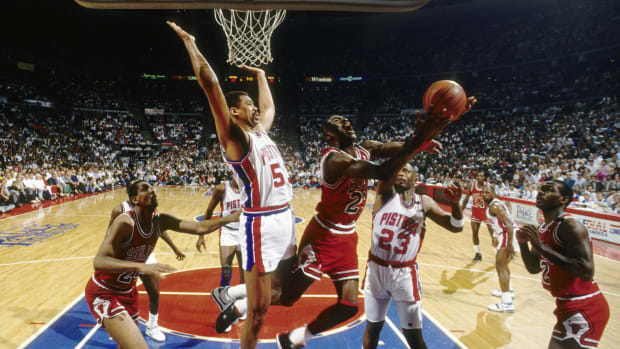 May 1989; Chicago Bulls guard Michael Jordan attempts a layup against the Detroit Pistons during the 1989 Eastern Conference Finals