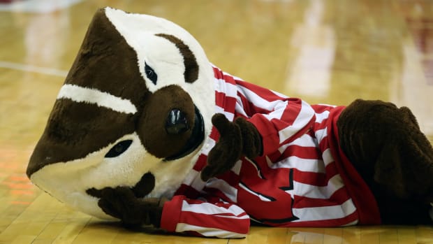 Bucky Badger posing for a photo during a Wisconsin basketball game (Credit: Mary Langenfeld-USA TODAY Sports)