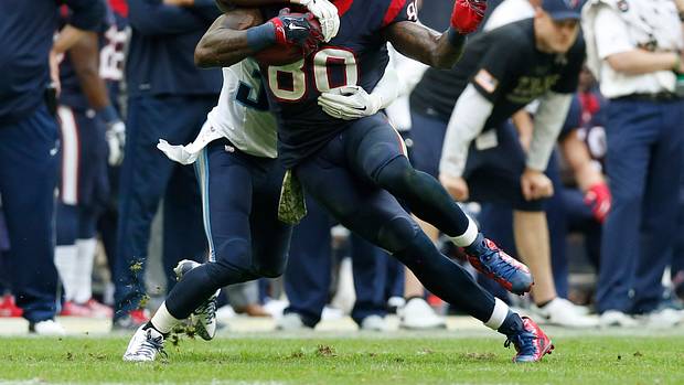 Texans receiver Andre Johnson (80) runs after a reception against the Tennessee Titans at NRG Stadium.