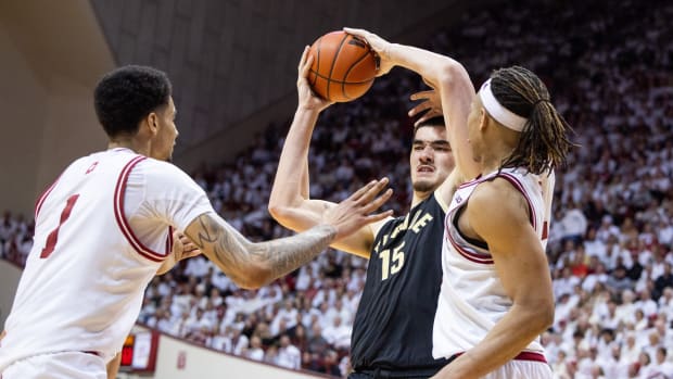 Purdue Boilermakers center Zach Edey (15) looks to shoot the ball while Indiana Hoosiers center Kel'el Ware (1) and forward Malik Reneau (5) defend in the second half at Simon Skjodt Assembly Hall.