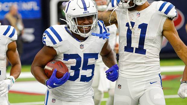 Indianapolis Colts running back Deon Jackson (35) is congratulated by wide receiver Michael Pittman (11) after Jackson scored a touchdown during the fourth quarter of the game Sunday, Dec. 5, 2021, at NRG Stadium in Houston. Indianapolis Colts Versus Houston Texans On Sunday Dec 5 2021 At Nrg Stadium In Houston Texas