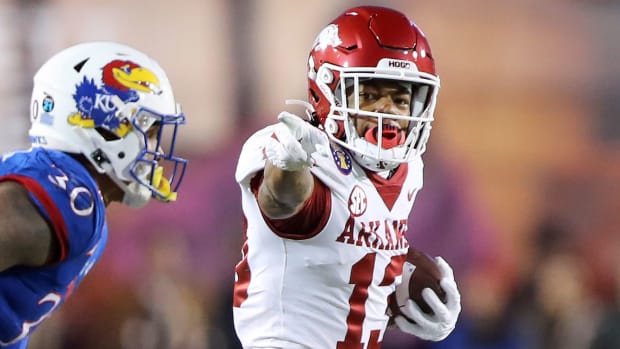 Arkansas receiver Jaedon Wilson signals for a first down against Kansas during the 2022 Liberty Bowl.
