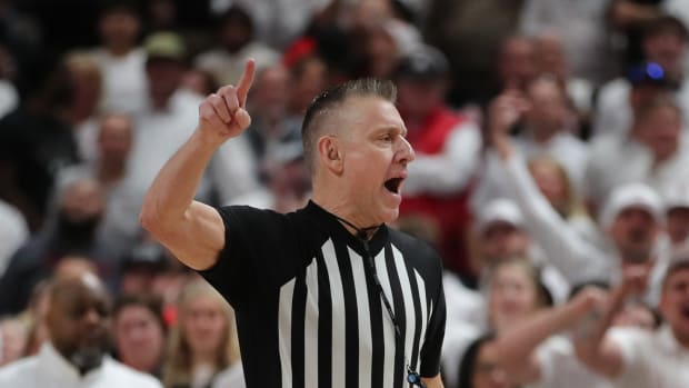 Feb 12, 2024; Lubbock, Texas, USA; Big 12 official Ray Natili ejects Kansas Jayhawks head coach Bill Self in the second half against the Texas Tech Red Raiders at United Supermarkets Arena. Mandatory Credit: Michael C. Johnson-USA TODAY Sports  