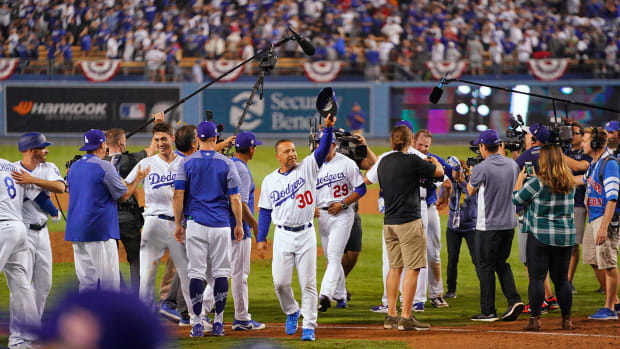 The Los Angeles Dodgers celebrating winning Game 3 of the 2018 World Series