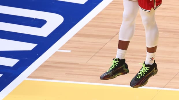 Anthony Edwards' black and green adidas sneakers worn in the 2024 NBA All-Star Game.
