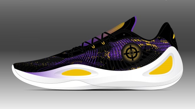 Side view of Austin Reaves' black and purple shoe.