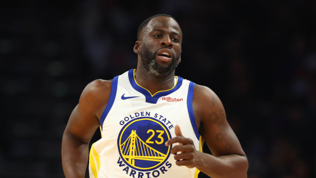 Warriors forward Draymond Green runs on the court during a game.