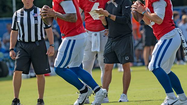Indianapolis Colts quarterbacks Anthony Richardson (5), from left in red jerseys, Sam Ehlinger (4) and Gardner Minshew II (10) run drills during Colts Camp practice at Grand Park, Tuesday, Aug. 1, 2023 in Westfield.