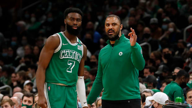 Jan 31, 2022; Boston, Massachusetts, USA; Boston Celtics head coach Ime Udoka talks with guard Jaylen Brown (7) during the second half against the Miami Heat at TD Garden