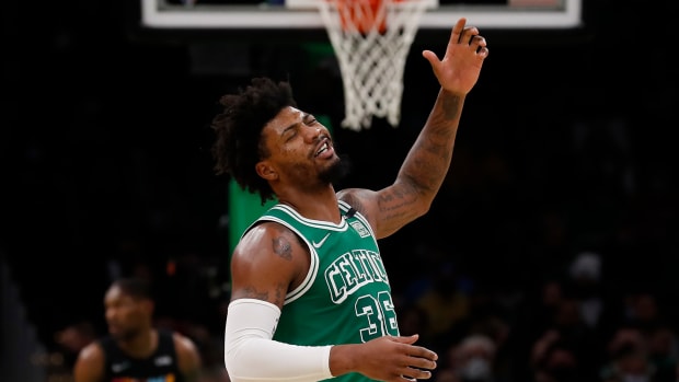 Jan 31, 2022; Boston, Massachusetts, USA; Boston Celtics guard Marcus Smart (36) reacts to missing a shot against the Miami Heat during the second quarter at TD Garden.