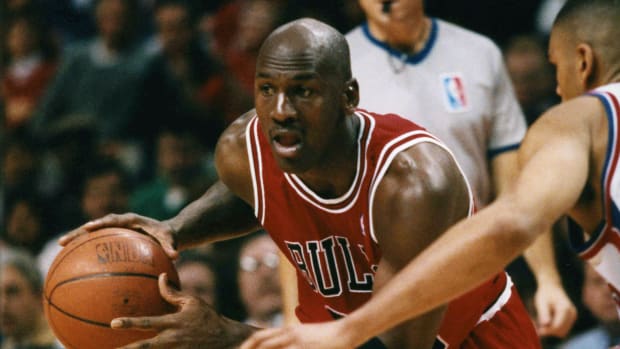 February 15, 1996; Chicago Bulls guard Michael Jordan drives the ball vs.Detroit Pistons