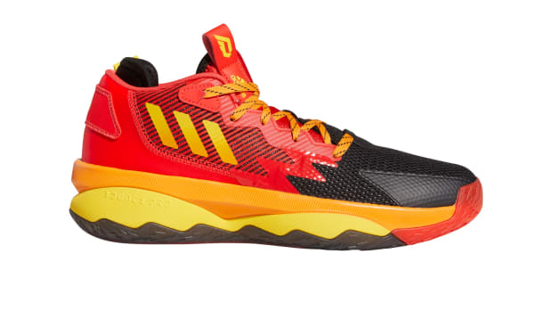 Red, black, and yellow Dame 8 shoes.