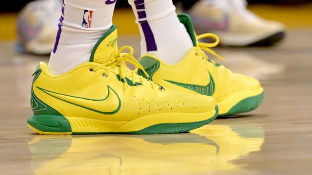 Los Angeles Lakers forward LeBron James' yellow and green Nike sneakers.
