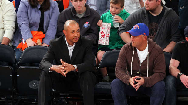 Former New York Knicks player John Starks sits courtside at Madison Square Garden