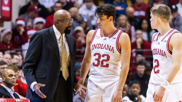 Indiana Hoosiers head coach Mike Woodson talks with guard Trey Galloway (32) in the first half against the Morehead State Eagles at Simon Skjodt Assembly Hall.