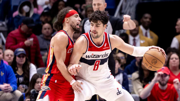 Washington Wizards forward Deni Avdija (8) drives with the ball against New Orleans Pelicans guard Jose Alvarado (15) during the second half at Smoothie King Center. Mandatory Credit: Stephen Lew-USA TODAY Sports