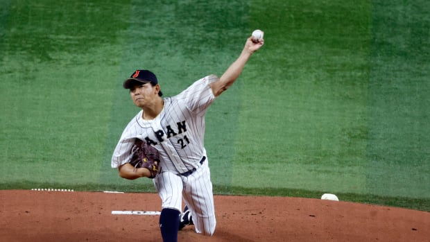 Mar 21, 2023; Miami, Florida, USA; Japan starting pitcher Shota Imanaga (21) pitches against the USA in the first inning at LoanDepot Park. Mandatory Credit: Rhona Wise-USA TODAY Sports  