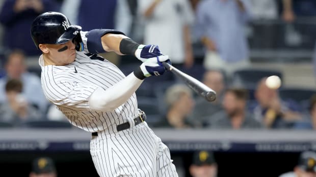 Sep 21, 2022; Bronx, New York, USA; New York Yankees right fielder Aaron Judge (99) hits a ground rule double against the Pittsburgh Pirates during the fifth inning at Yankee Stadium. Mandatory Credit: Brad Penner-USA TODAY Sports