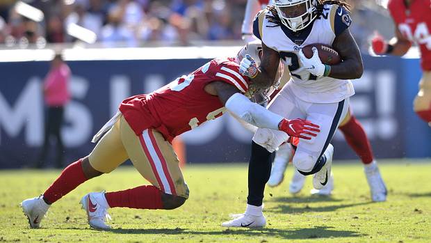 Los Angeles Rams running back Darrell Henderson (27) is tackled by San Francisco 49ers middle linebacker Kwon Alexander (56)