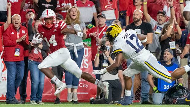 Rahmir Johnson sprints toward the end zone for a 41-yard touchdown on a pass from Adrian Martinez late in the third quarter.