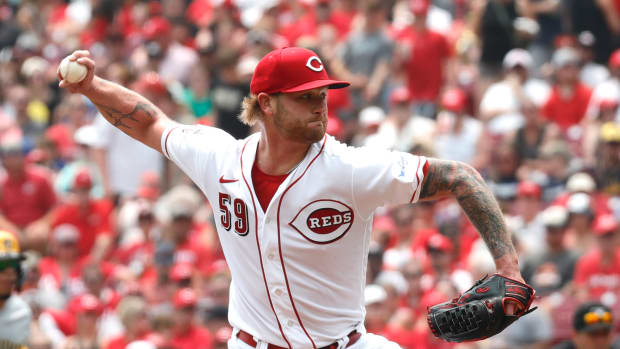 Jul 16, 2023; Cincinnati, Ohio, USA; Cincinnati Reds starting pitcher Ben Lively (59) throws against the Milwaukee Brewers during the first inning at Great American Ball Park. Mandatory Credit: David Kohl-USA TODAY Sports