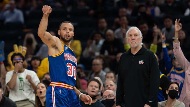 Stephen Curry and Gregg Popovich