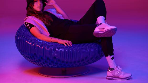 Sofia Huerta models Lotto Brand apparel.
