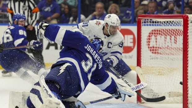 Toronto Maple Leafs center John Tavares scores a goal on Tampa Bay Lightning goaltender Jonas Johansson