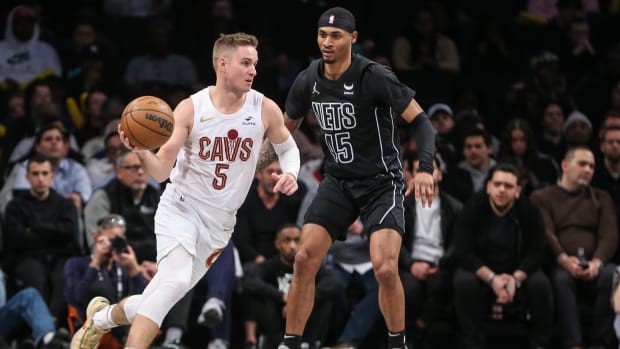 Feb 8, 2024; Brooklyn, New York, USA; Cleveland Cavaliers guard Sam Merrill (5) looks to drive past Brooklyn Nets guard Keon Johnson (45) in the fourth quarter at Barclays Center. Mandatory Credit: Wendell Cruz-USA TODAY Sports
