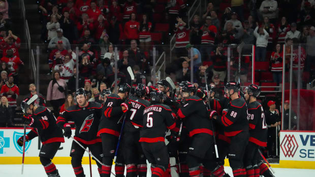 The Carolina Hurricanes celebrate their victory against the Montreal Canadiens